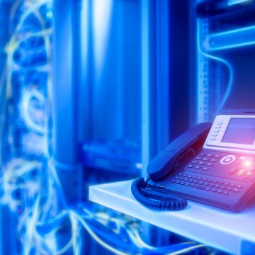 axvoice voip services features voip phone servers in the background